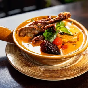 Clay pot with duck in red curry IG @Bitehouston