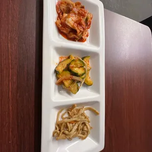 Kimchi, cucumbers, fish skin