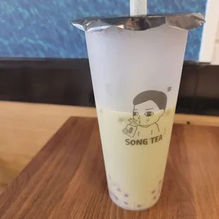 Strawberry Matcha Iced Tea Latte with Strawberry-flavored Pooping Boba Pearls.