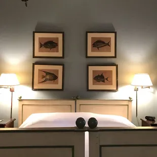 The king antique bed is super comfy with all frette linens/bedding &amp; feather pillows...