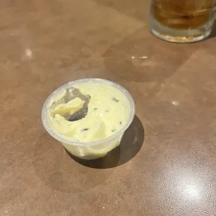 Garlic butter served with bread for the table