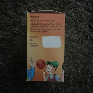 two children playing with a basketball ball