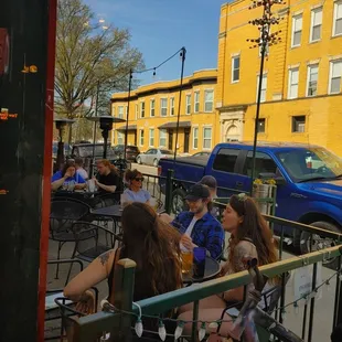 a group of people sitting outside