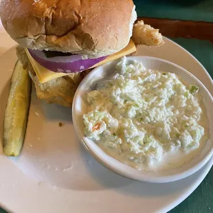 a sandwich with a side of coleslaw