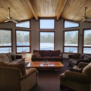 The living room.  There&apos;s another couch and two big, cozy chairs not pictured.
