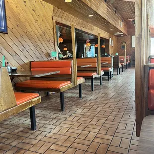 a row of benches in a restaurant
