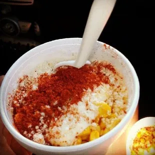 How about some Chile powder on your corn in the cup?