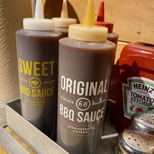 two bottles of bbq sauce