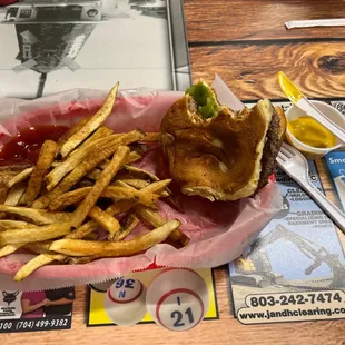 a basket of fries and a sandwich