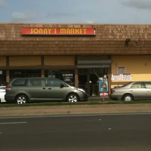 cars parked in front of the store