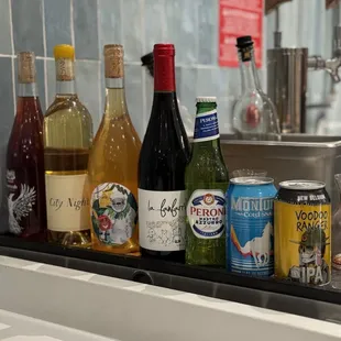 a variety of beverages on a counter