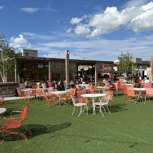 Outside - tables, cornhole, and more