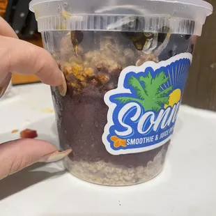 Majority of the cup is extra toppings