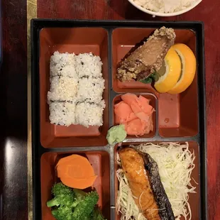 a bento box of food