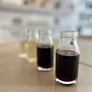 two bottles of wine on a table