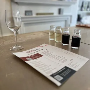 a menu and wine glasses