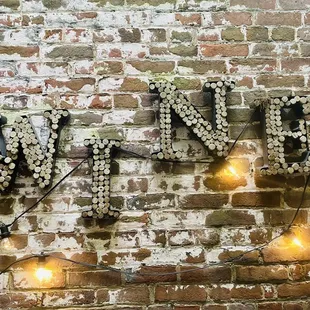 the word sonoma on a brick wall