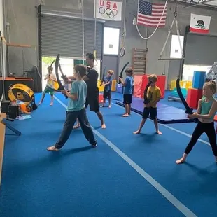 Coach Keaton teaching the parkour class how to be little ninjas!