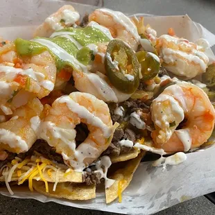 Surf &amp; Turf Nachos..... my first time eating here and it was BOMB  I will definitely be coming back