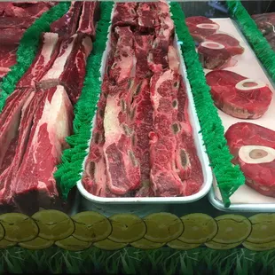 a variety of raw meat on display