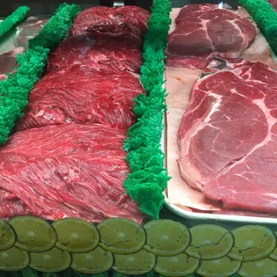a display of raw meat