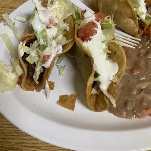 Crispy shredded beef tacos