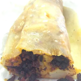 Inside of a potato and chorizo burrito. Simple but Delish!
