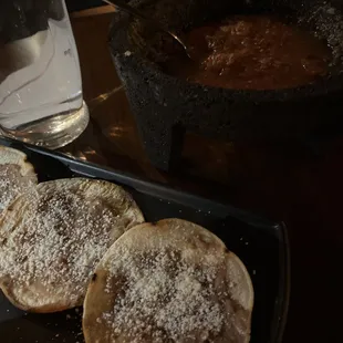 a plate of food and a glass of water