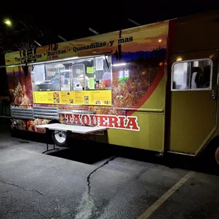 a food truck parked in a parking lot
