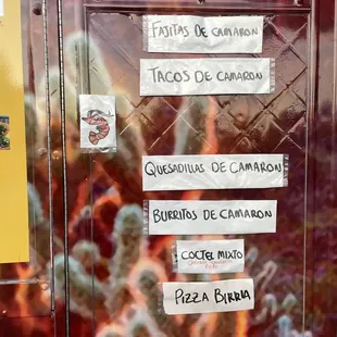 a sign on a food truck
