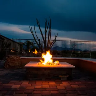a fire pit on a patio