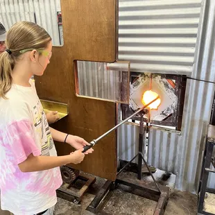 Turning the glass in the furnace