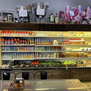 A wonderful selection of beverages, cheeses, and fresh food