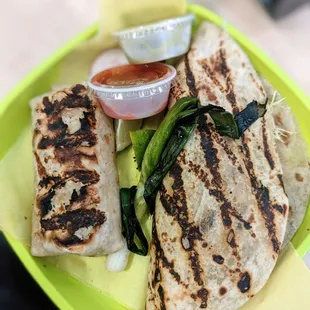 Bean and cheese burrito on the left and Lorenzo on the right.