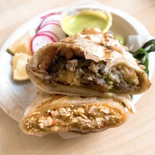 Cross sections of the Burrito 2.0 with Steak &amp; Chivichanga Shredded Chicken. Pretty small portions so try BOTH!