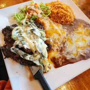 a plate of mexican food on a table