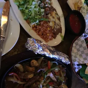 a variety of mexican food on a table
