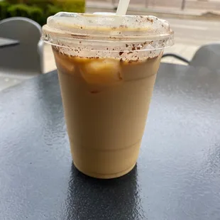 Iced oatmilk latte with honey and cinnamon