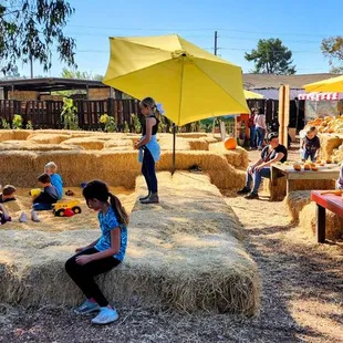 Corn kernel pit and hay maze for littles