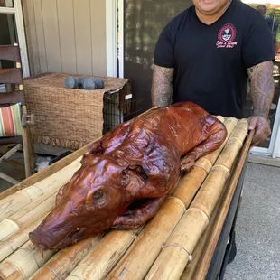 Larry delivers the pig!