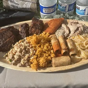 Bbq short ribs, lumpia, red rice, empanadas, lechon, chicken keleguen, bbq