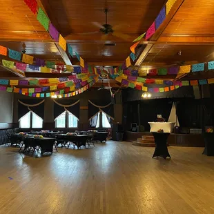 a large room with tables and chairs