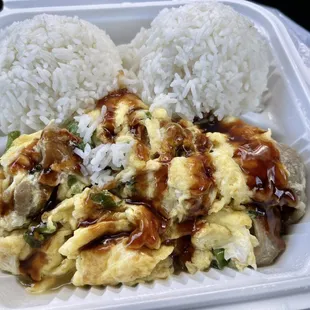 a meal in a styrofoam container