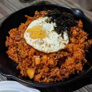 a fried egg and rice dish