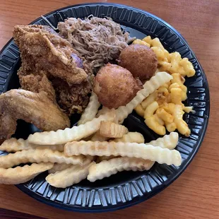 Pork or Chicken BBQ &amp; Southern Fried Chicken, Mac &amp; Cheese, Hushpuppies and French fries.