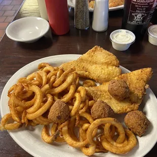 Catfish Dinner with curly fries + salad bar $9.99.