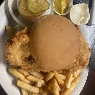 a plate of food with a burger and french fries