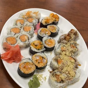 left to right: spicy crab, spicy scallop (seaweed outside), sweet potato roll