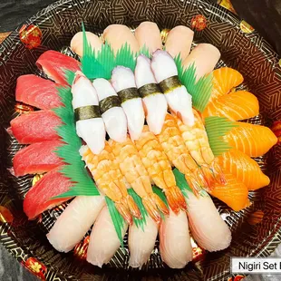 a plate of sushi and shrimp