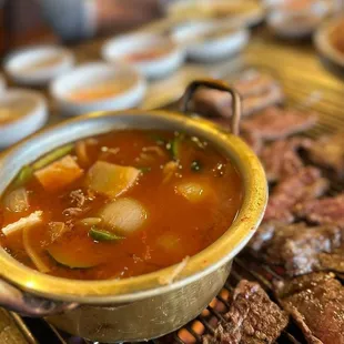 a bowl of beef and vegetable soup